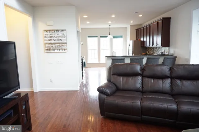 a living room with a couch and a flat screen tv