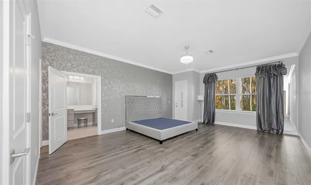 a spacious bathroom with a double vanity sink double and mirror