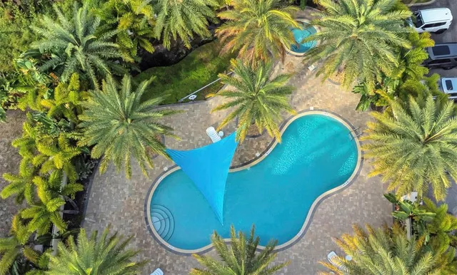 a view of a balcony with wooden fence