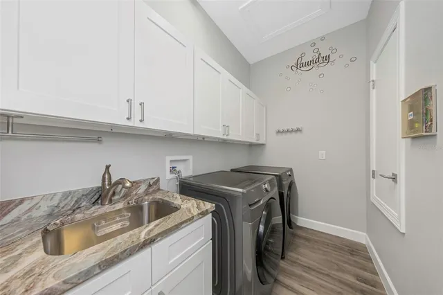 a view of a house with a palm tree