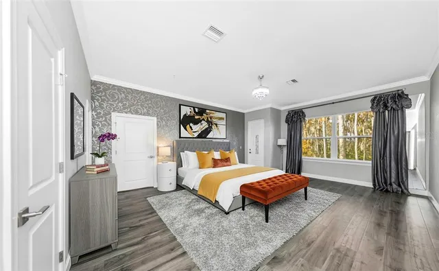 a room with a bed and a window