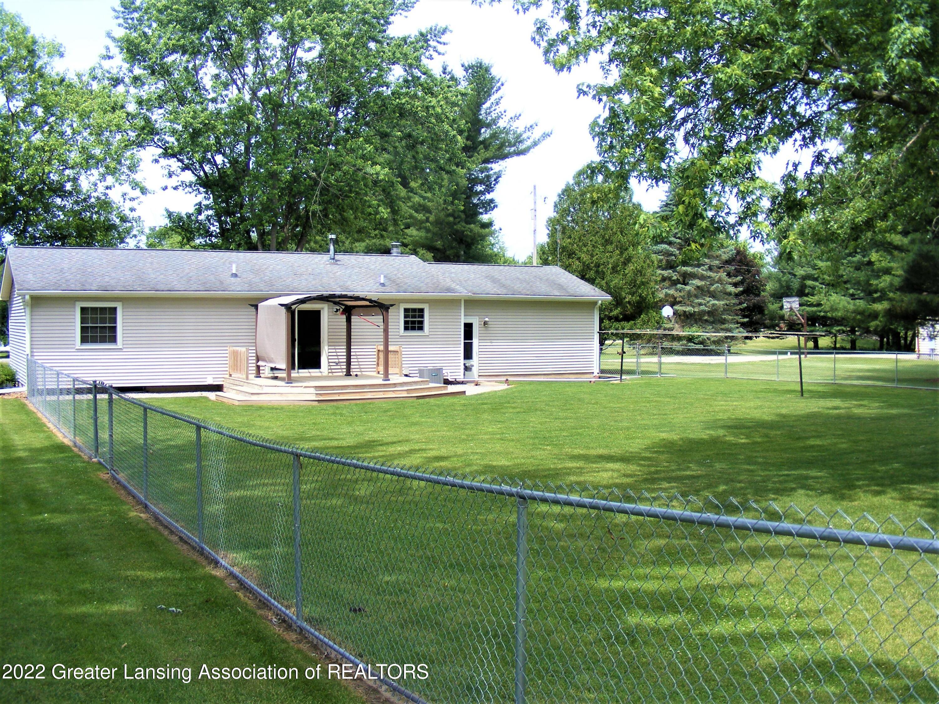 2183 Arch Road Eaton Rapids, MI 48827 - Photo 33 of 34 back yard, fence area
