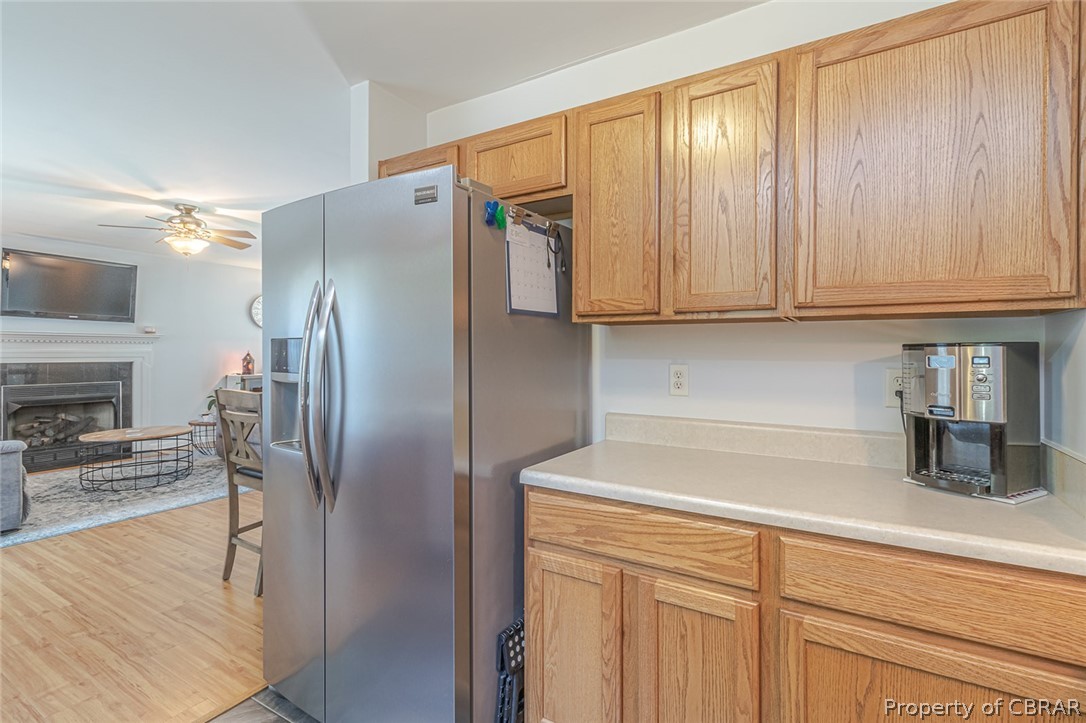 11654 Courthouse Road Lancaster, VA 22503 - Photo 15 of 35 a kitchen with stainless steel appliances granite countertop a refrigerator and cabinets