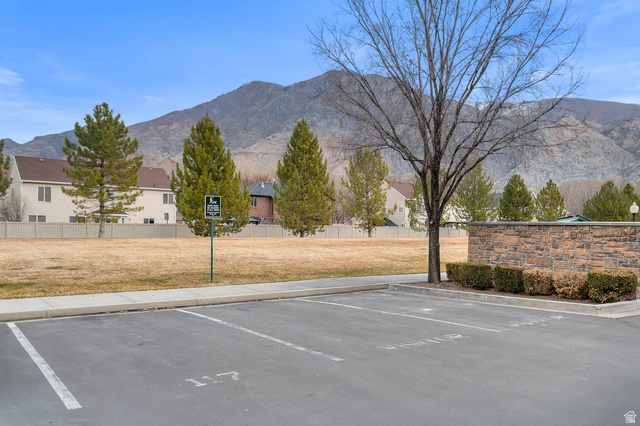 476 West 200 N Street, Unit 206 Springville, UT 84663 - Photo 23 of 24 Uncovered parking lot featuring a mountain view