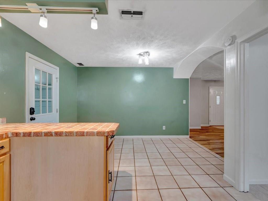977 Farm To Market 347 Rusk, TX 75785 - Photo 15 of 33 a view of a big room with wooden floor
