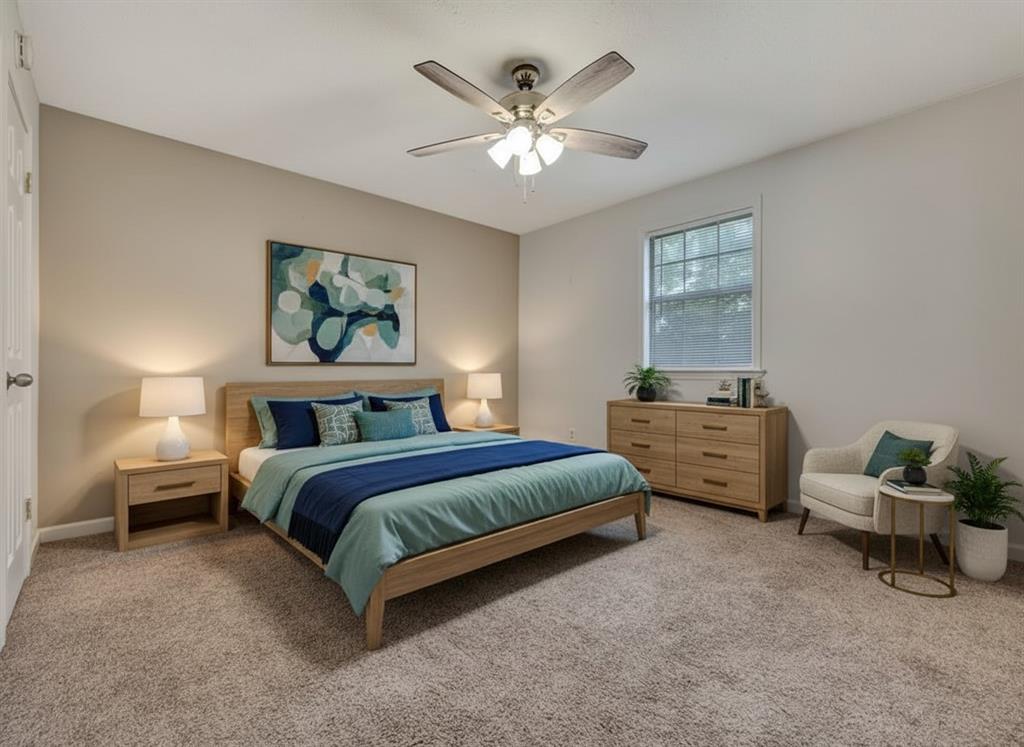 977 Farm To Market 347 Rusk, TX 75785 - Photo 20 of 33 a spacious bedroom with a bed a couch and a chandelier
