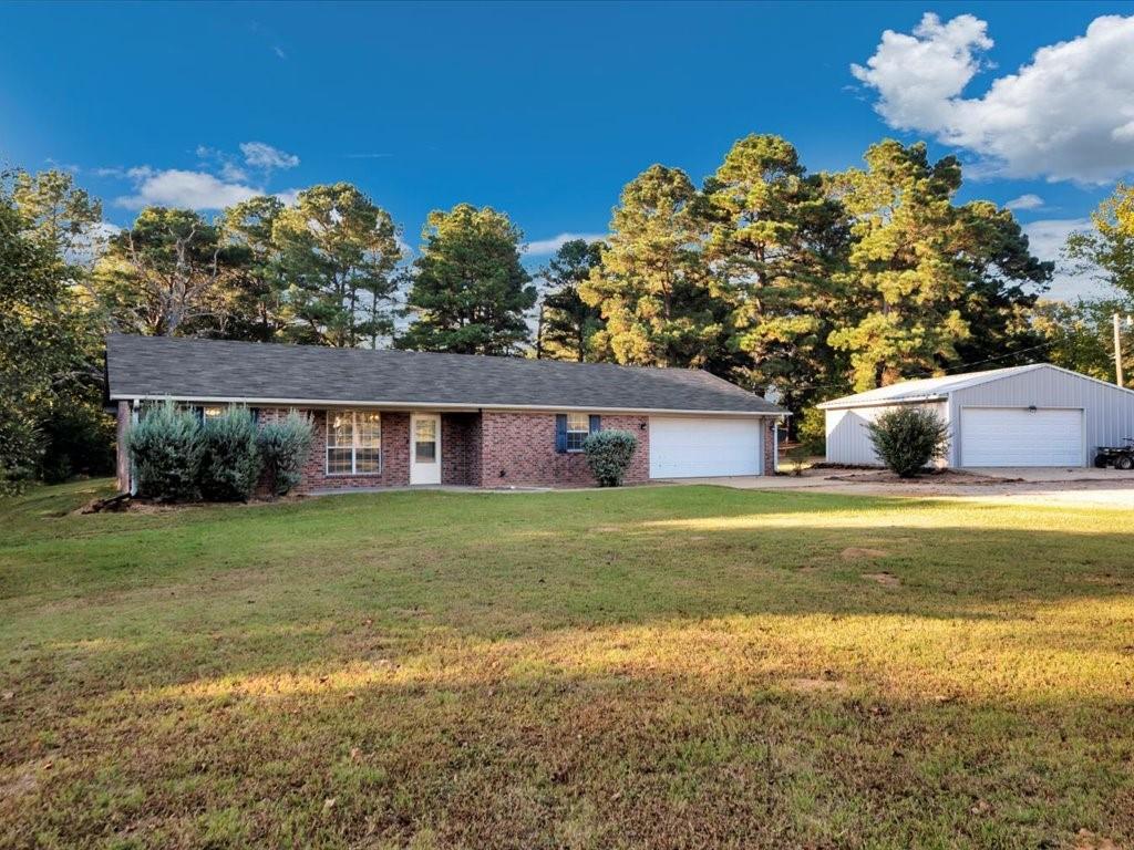 977 Farm To Market 347 Rusk, TX 75785 - Photo 3 of 33 a house view with a outdoor space