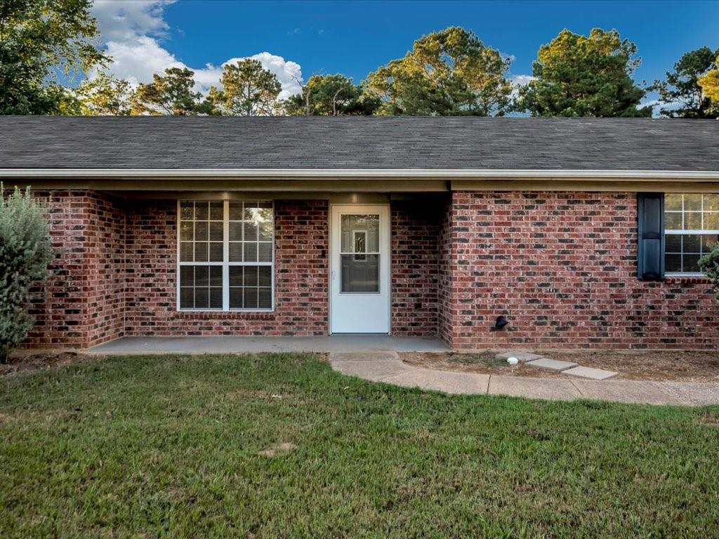 977 Farm To Market 347 Rusk, TX 75785 - Photo 6 of 33 a front view of a house with a yard