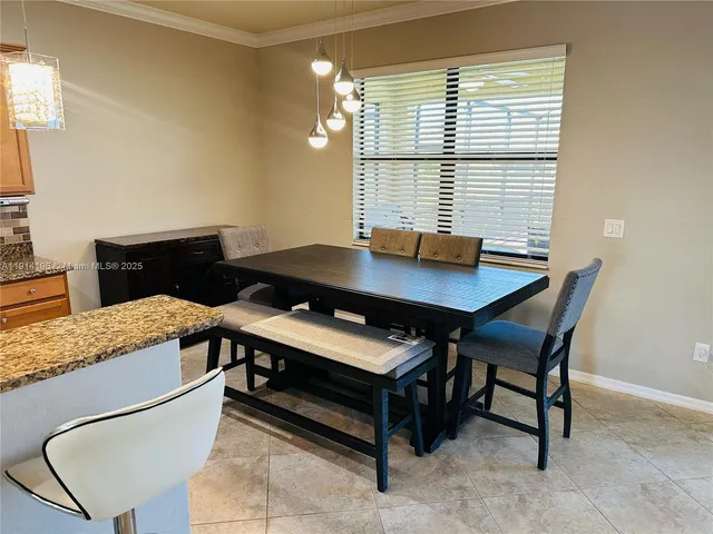 a view of a workspace with furniture