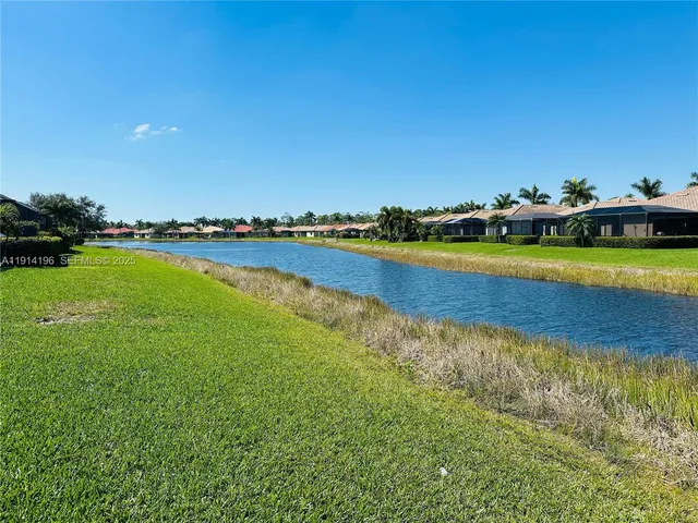 a view of a swimming pool and an ocean view