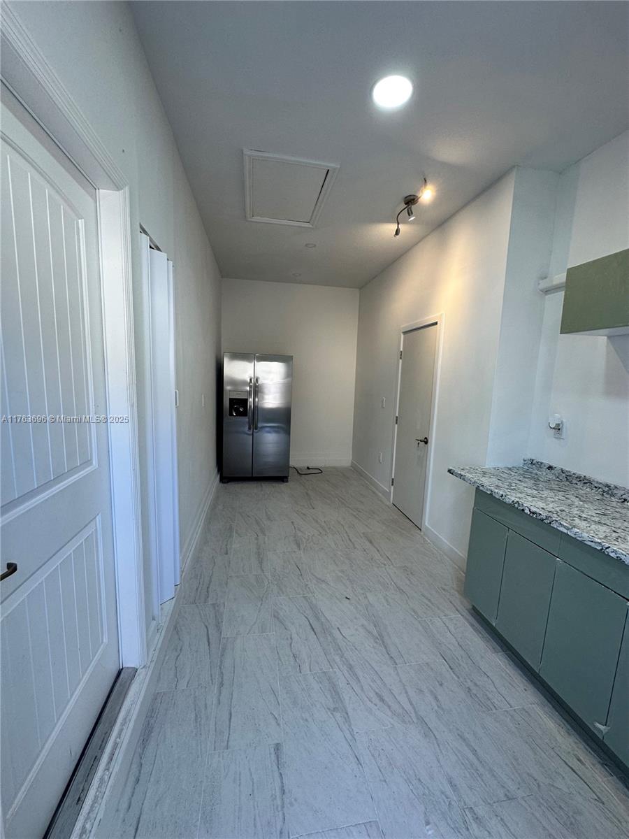 13137 Southwest 284th Street, Unit B Homestead, FL 33033 - Photo 7 of 11 a view interior of a house with wooden floor