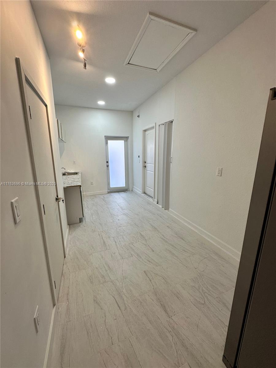 13137 Southwest 284th Street, Unit B Homestead, FL 33033 - Photo 9 of 11 a view of a hallway