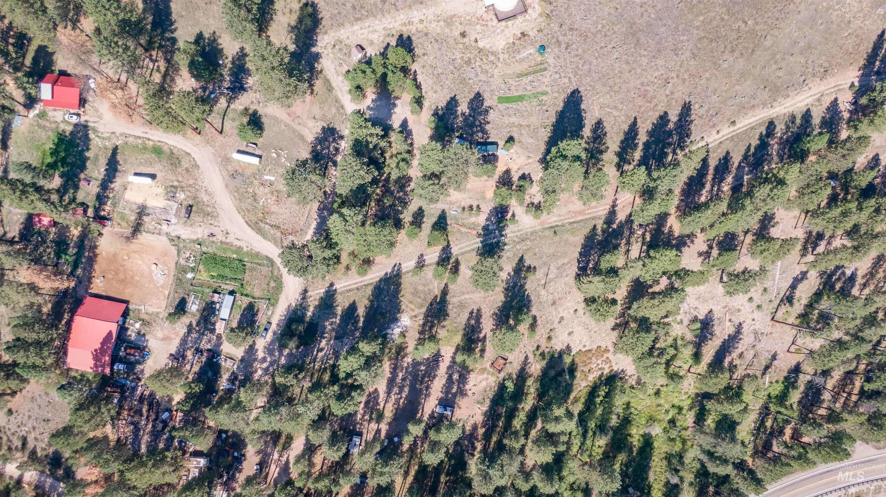 12 Plateau Road Lowman, ID 83637 - Photo 26 of 32 Aerial view of property and surrounding area with rural landscape