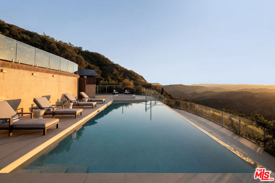 25155 Piuma Road Malibu, CA 90265 - Photo 1 of 23 a view of swimming pool with outdoor seating