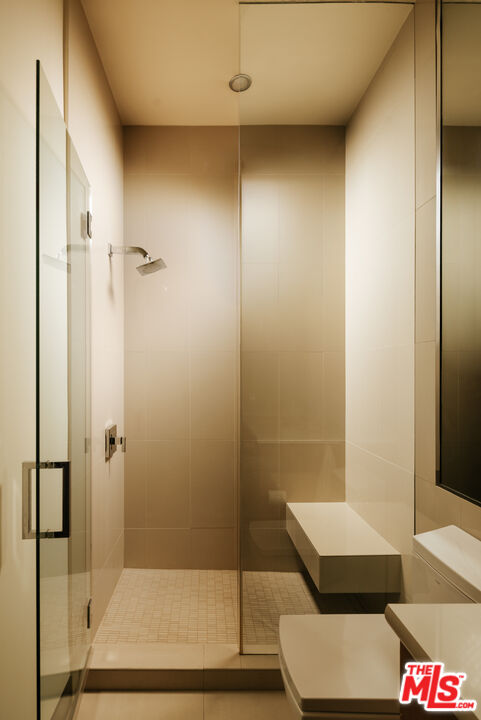 25155 Piuma Road Malibu, CA 90265 - Photo 12 of 23 a bathroom with a shower and toilet