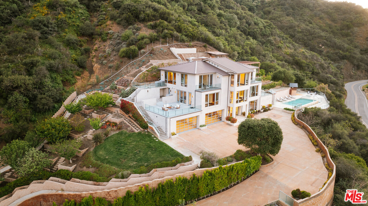 25155 Piuma Road Malibu, CA 90265 - Photo 22 of 23 an aerial view of a house with a yard and lake view