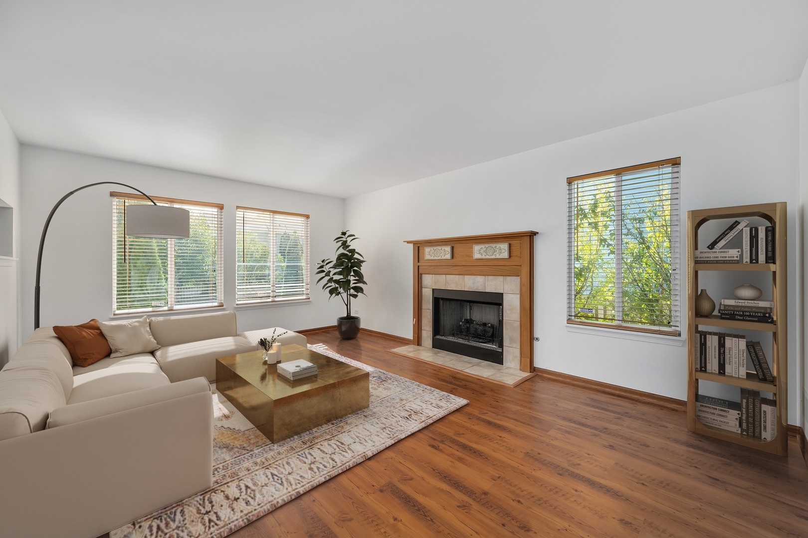 215 Berkeley Drive Bolingbrook, IL 60440 - Photo 12 of 28 a living room with furniture and a fireplace