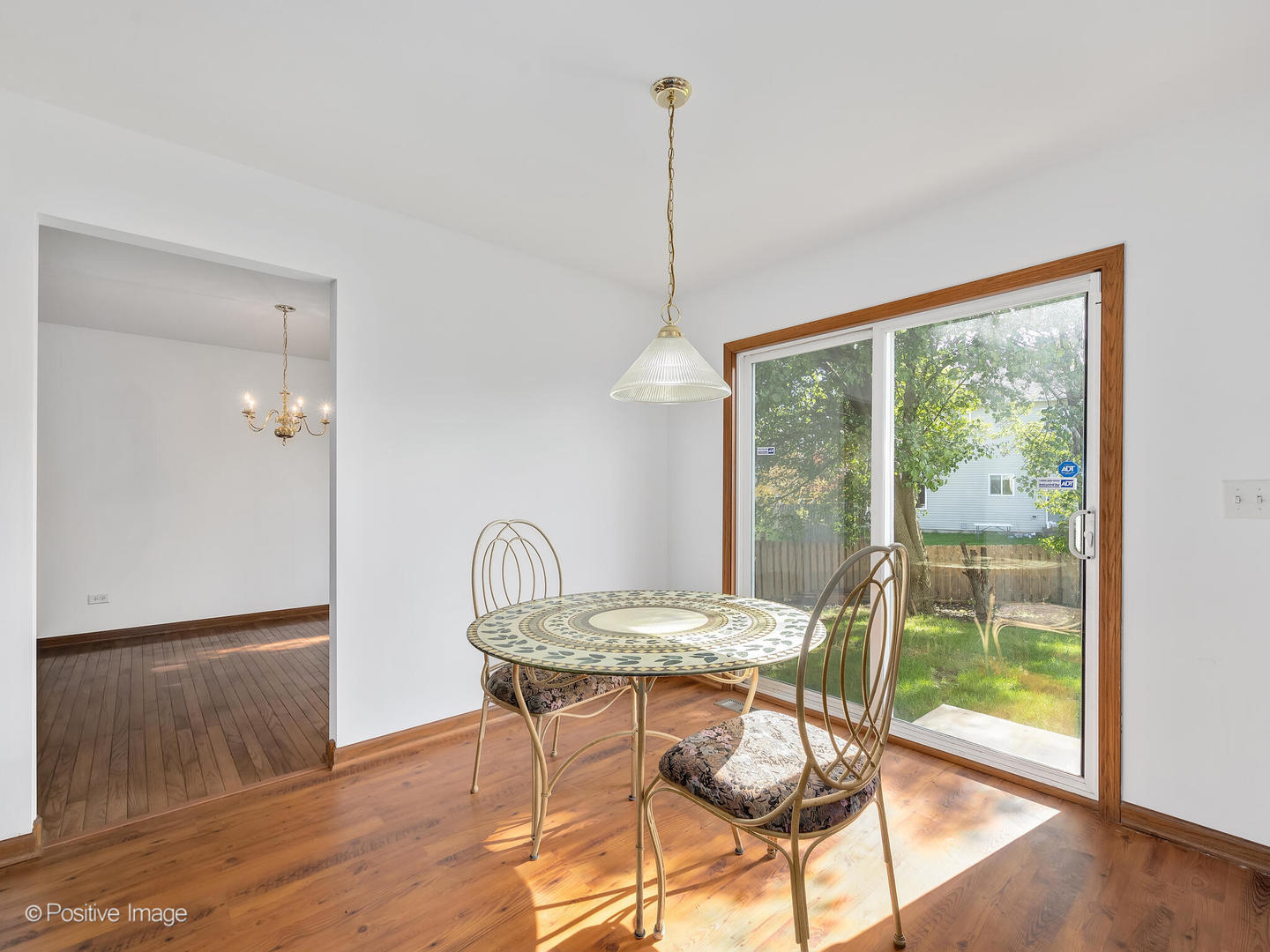 215 Berkeley Drive Bolingbrook, IL 60440 - Photo 13 of 28 a dining room with furniture and window