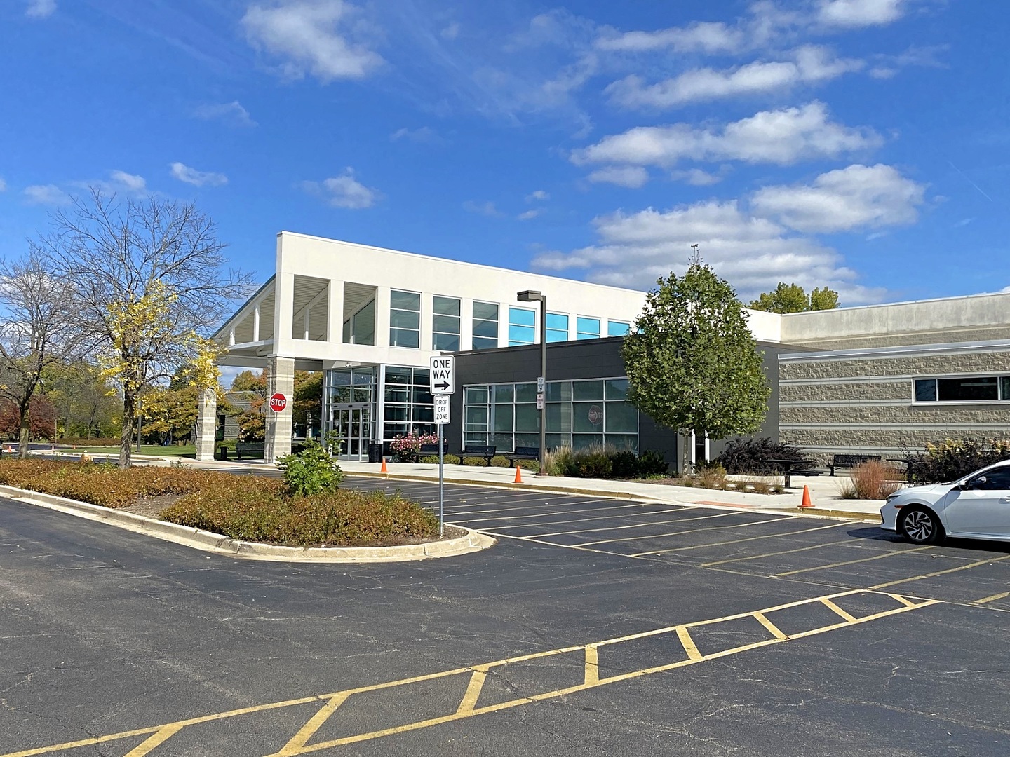 215 Berkeley Drive Bolingbrook, IL 60440 - Photo 27 of 28 a view of a parked cars in front of a building