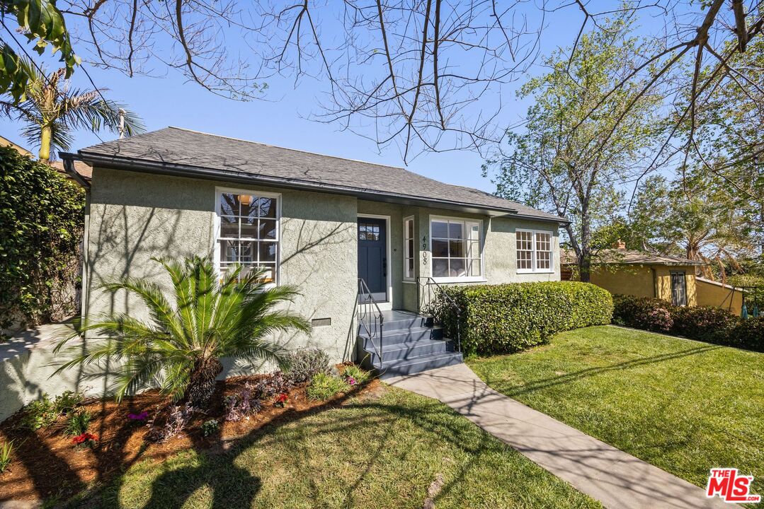 4908 Ramsdell Avenue La Crescenta, CA 91214 - Photo 2 of 29 a front view of a house with garden
