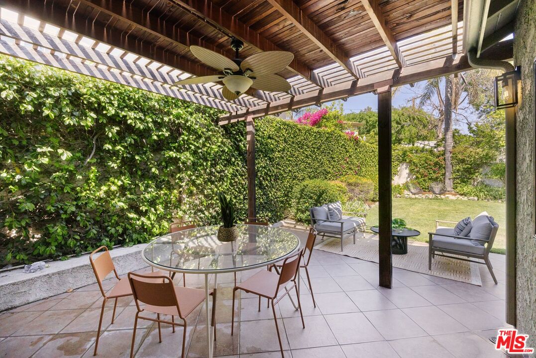 4908 Ramsdell Avenue La Crescenta, CA 91214 - Photo 25 of 29 a view of a patio with a table and chairs