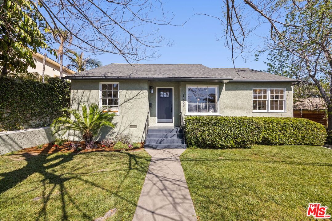 4908 Ramsdell Avenue La Crescenta, CA 91214 - Photo 3 of 29 a front view of a house with garden