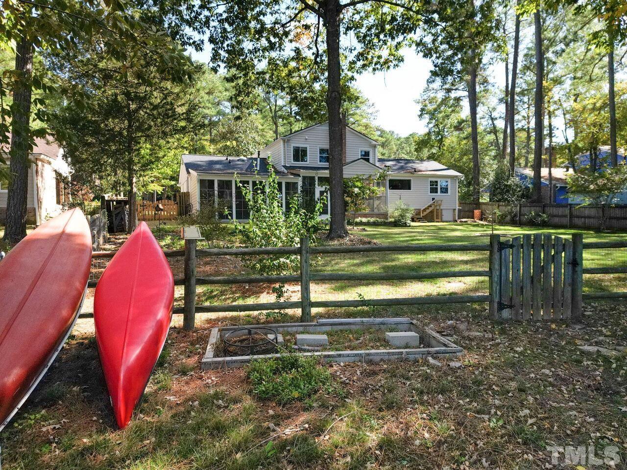 5304 Newhall Road Durham, NC 27713 - Photo 54 of 56 a view of a house with a yard