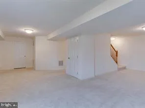 an empty room with an entryway