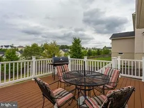a view of a chair in wooden deck