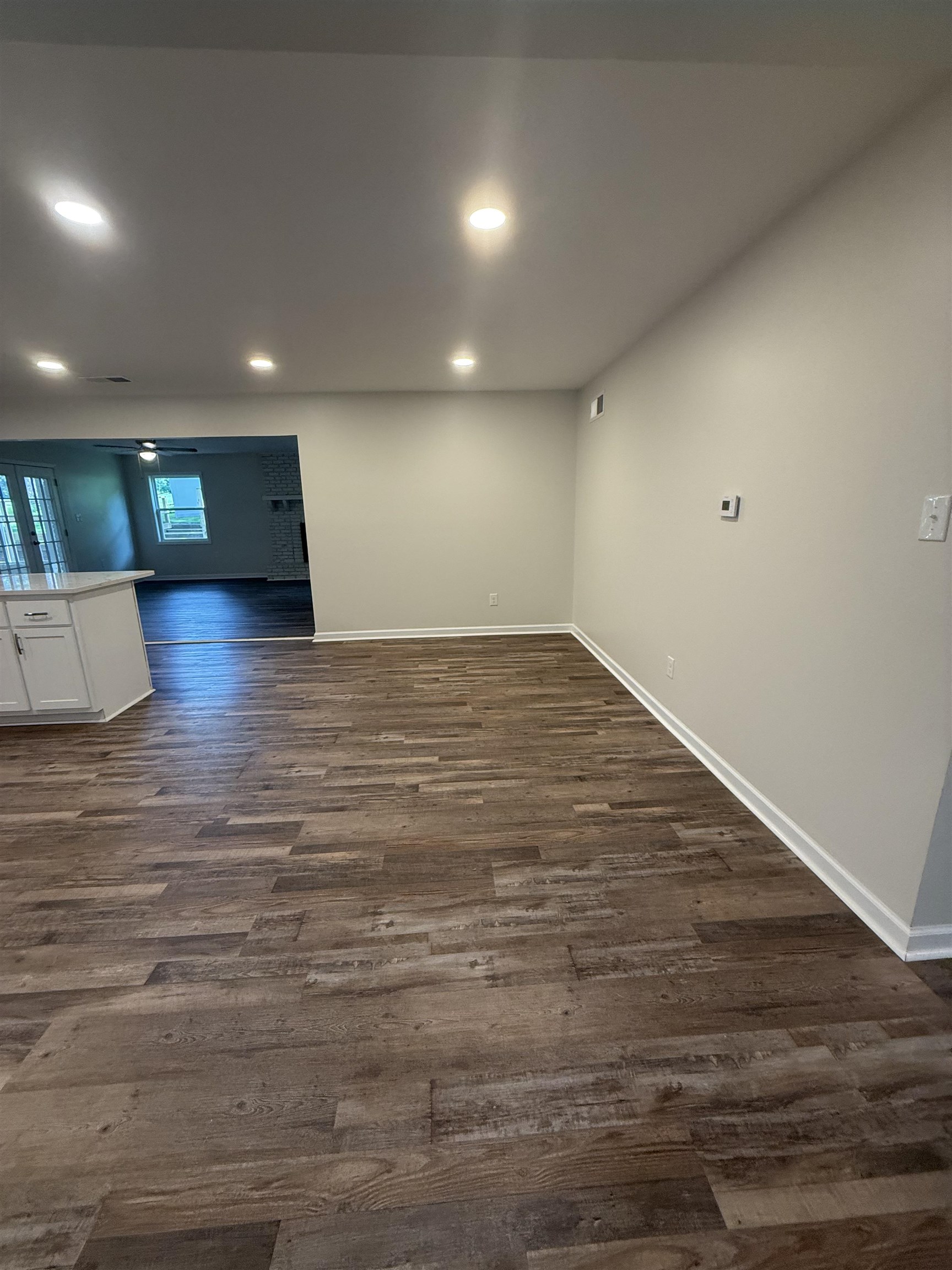 1835 Pleasant Grove Road Moscow, TN 38057 - Photo 12 of 34 Spacious interior featuring wood-finish flooring, recessed lighting, neutral wall tones, and white baseboards
