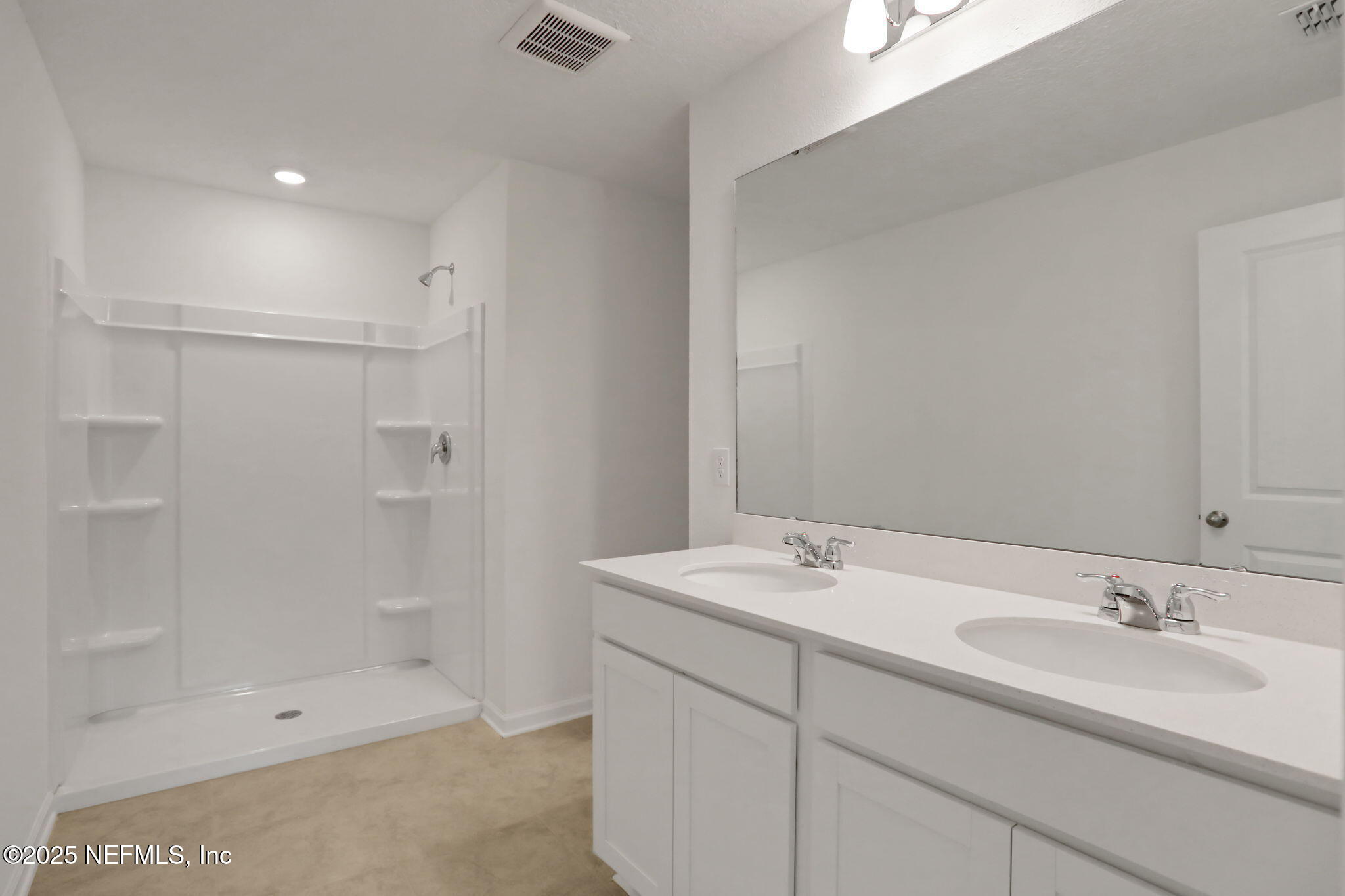 3761 Athenian Way Middleburg, FL 32068 - Photo 14 of 49 a bathroom with a sink a shower and a mirror