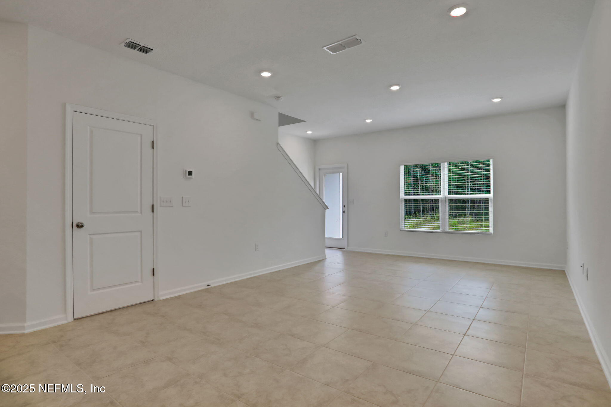 3761 Athenian Way Middleburg, FL 32068 - Photo 26 of 49 a view of an empty room with a window