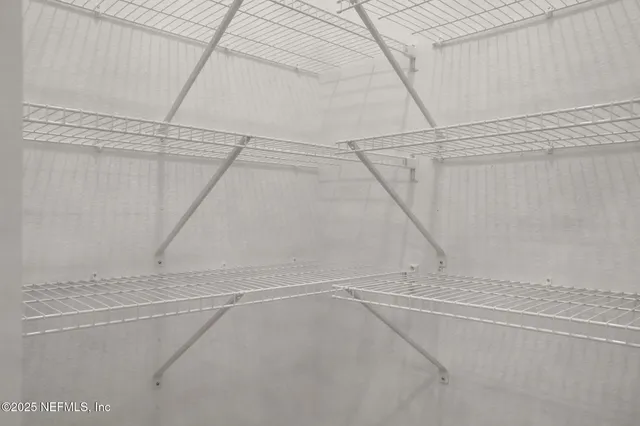 a view of a room with an empty space