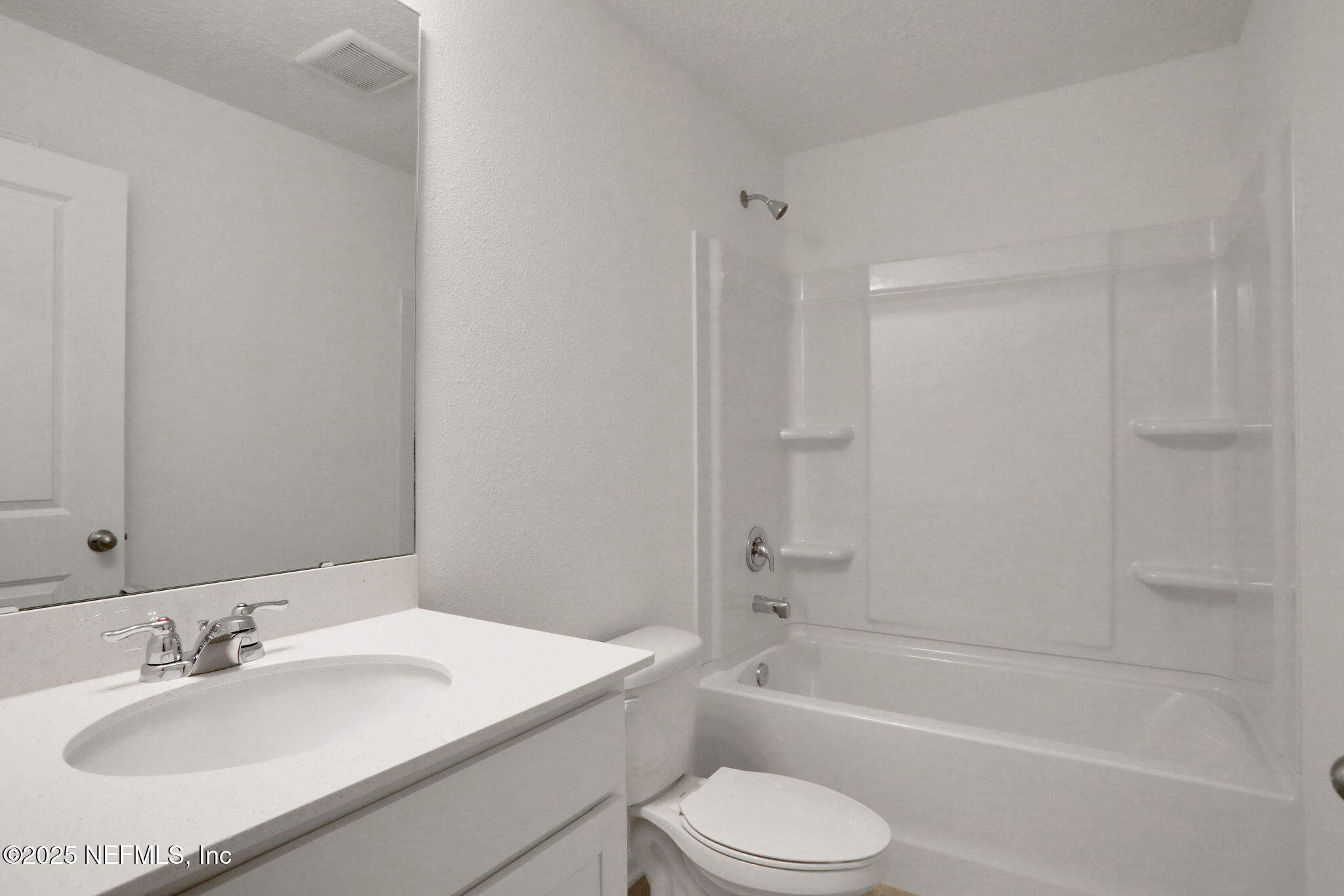 3761 Athenian Way Middleburg, FL 32068 - Photo 8 of 49 a bathroom with a sink toilet and bathtub