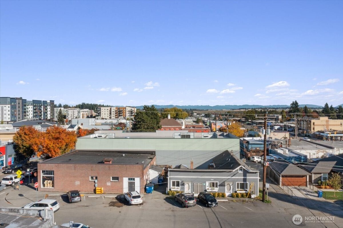 an aerial view of a building with outdoor space
