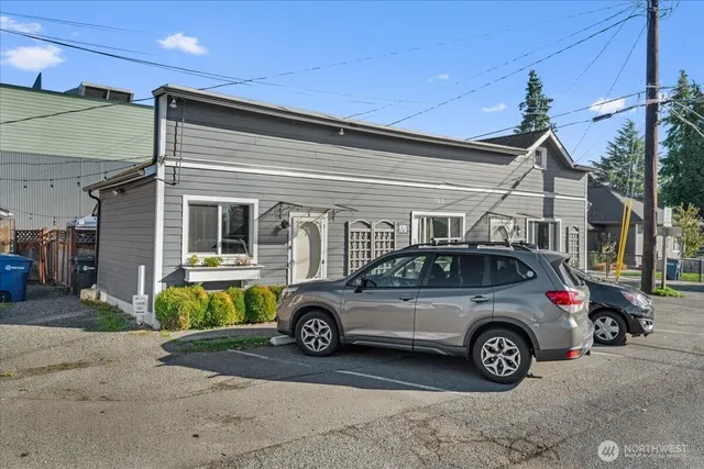 a car parked in front of a building