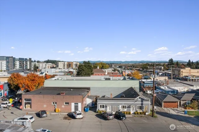 an aerial view of a building with outdoor space
