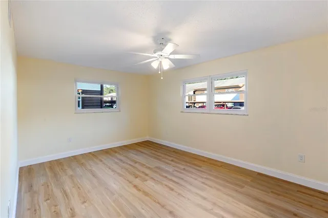 a bathroom with a sink a mirror and a shower