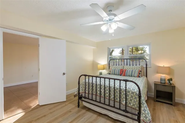 a bathroom with a sink a mirror and shower