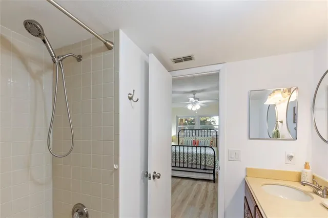 a view of a house with a yard covered with snow