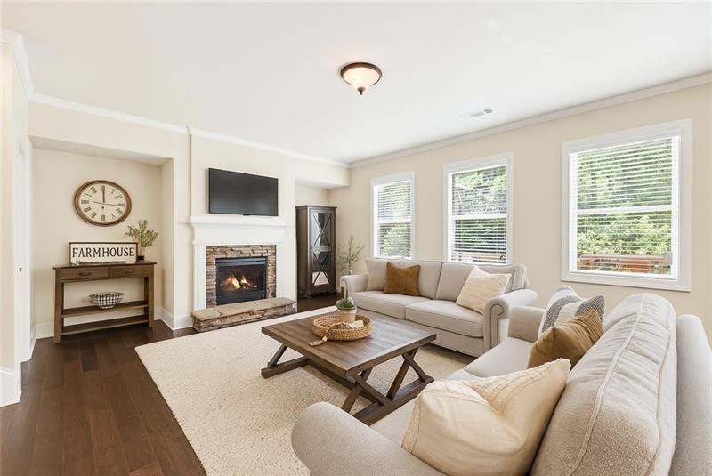 3225 Sundew Drive Acworth, GA 30101 - Photo 11 of 37 a living room with furniture fireplace and window