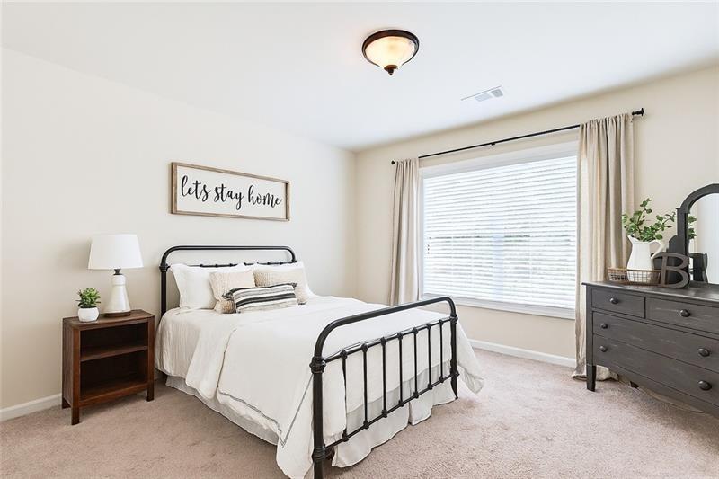 3225 Sundew Drive Acworth, GA 30101 - Photo 22 of 37 a bedroom with a bed and a window