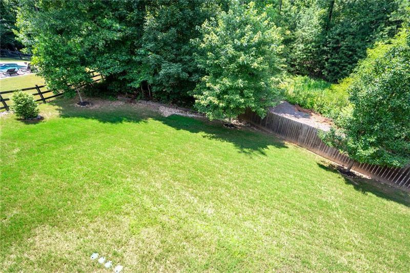 3225 Sundew Drive Acworth, GA 30101 - Photo 28 of 37 a backyard of a house with lots of green space