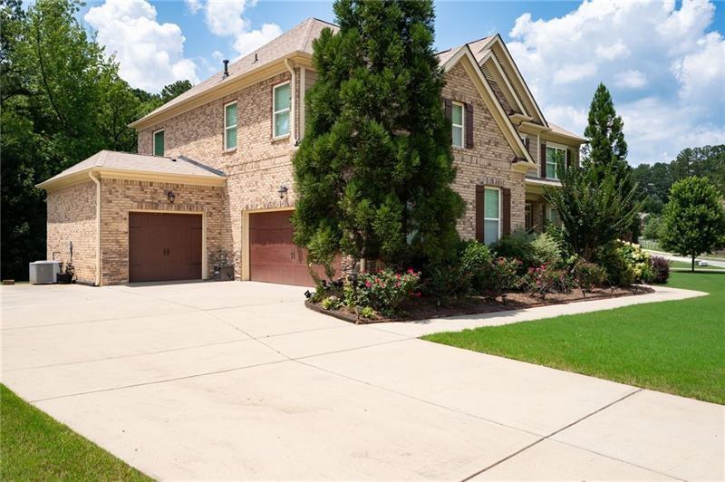 3225 Sundew Drive Acworth, GA 30101 - Photo 32 of 37 a view of house with yard and outdoor space