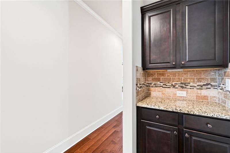 3225 Sundew Drive Acworth, GA 30101 - Photo 7 of 37 a view of kitchen with granite countertop cabinets and sink