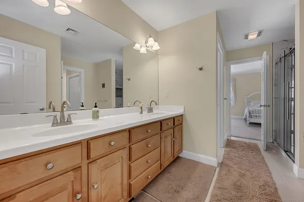 a view of a room with furniture and window