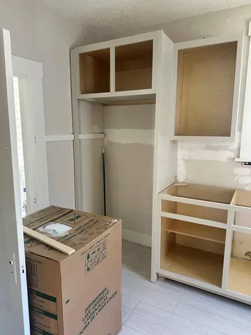 a utility room with washer and dryer