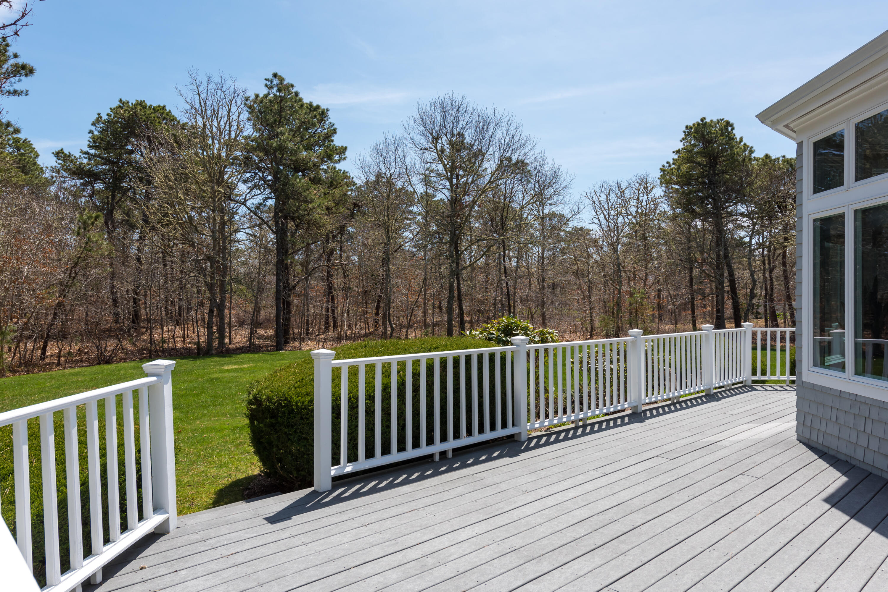 12 Somerset Road Harwich, MA 02645 - Photo 19 of 30 a view of a deck with trees