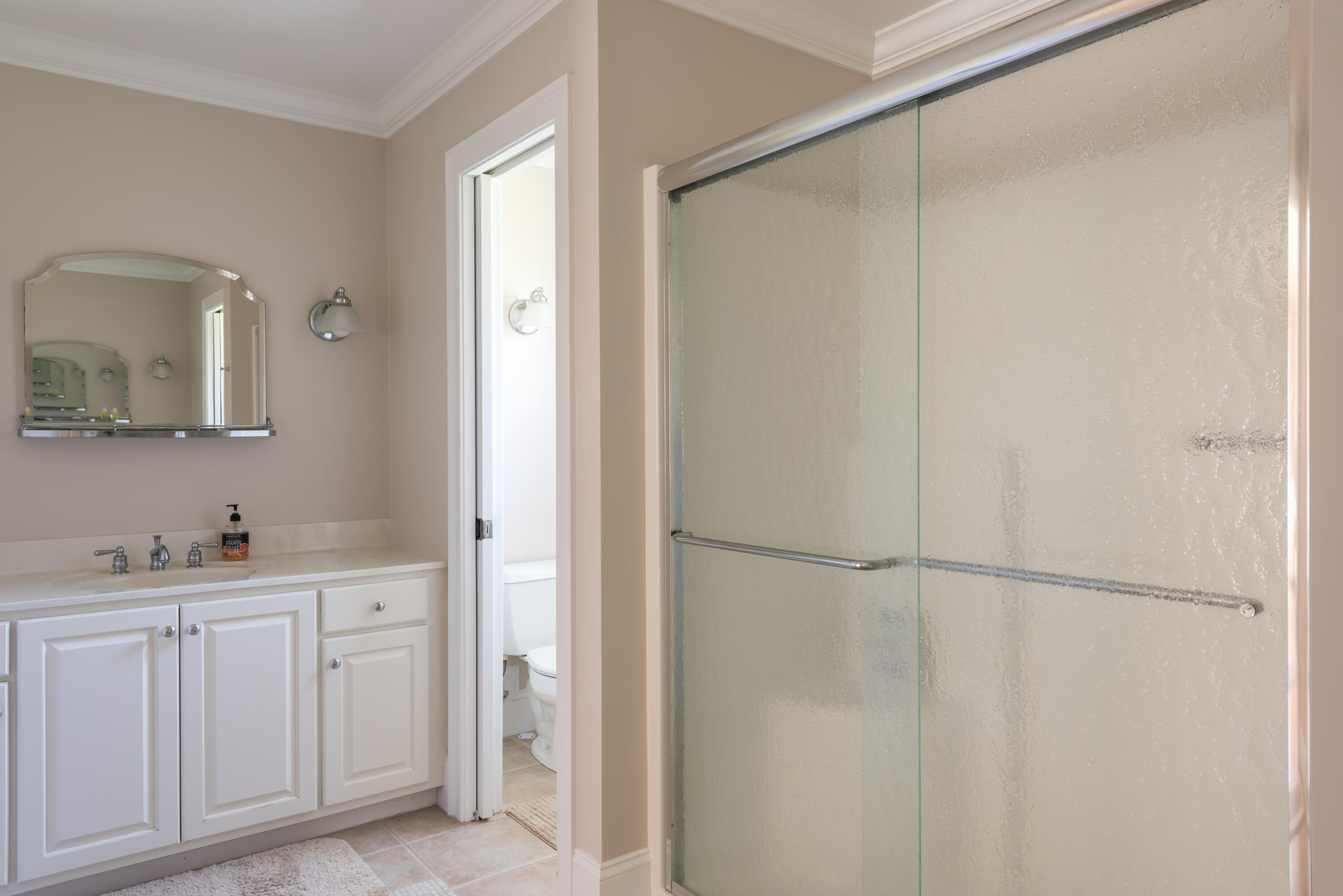 12 Somerset Road Harwich, MA 02645 - Photo 20 of 30 a bathroom with a double vanity sink and mirror