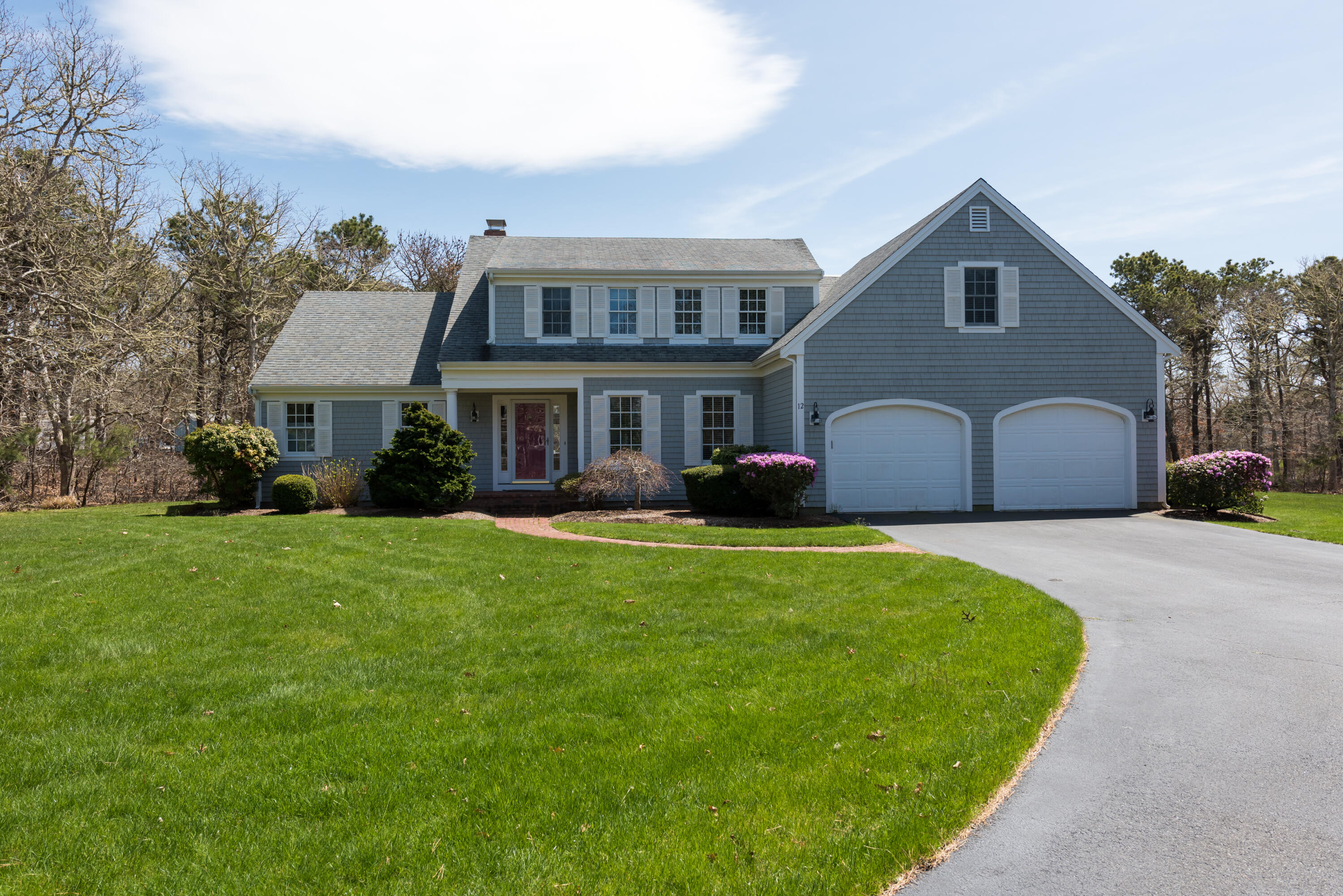 12 Somerset Road Harwich, MA 02645 - Photo 2 of 30 a front view of house with yard and trees